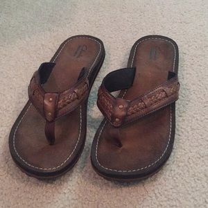 Clark’s flip flops